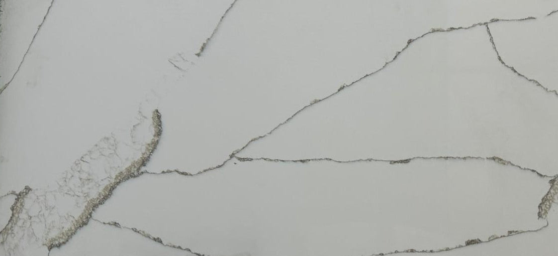 Close-up of a textured white surface with cracks